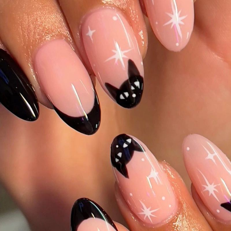 Simple black cat silhouette on nude nail background