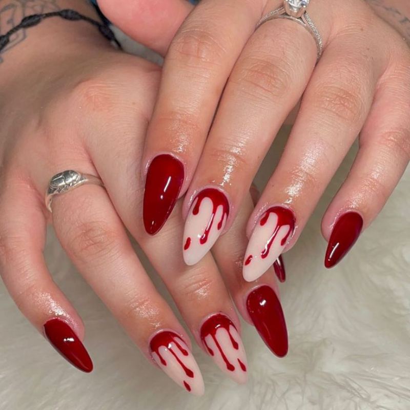 Red blood drip effect on nude halloween nails