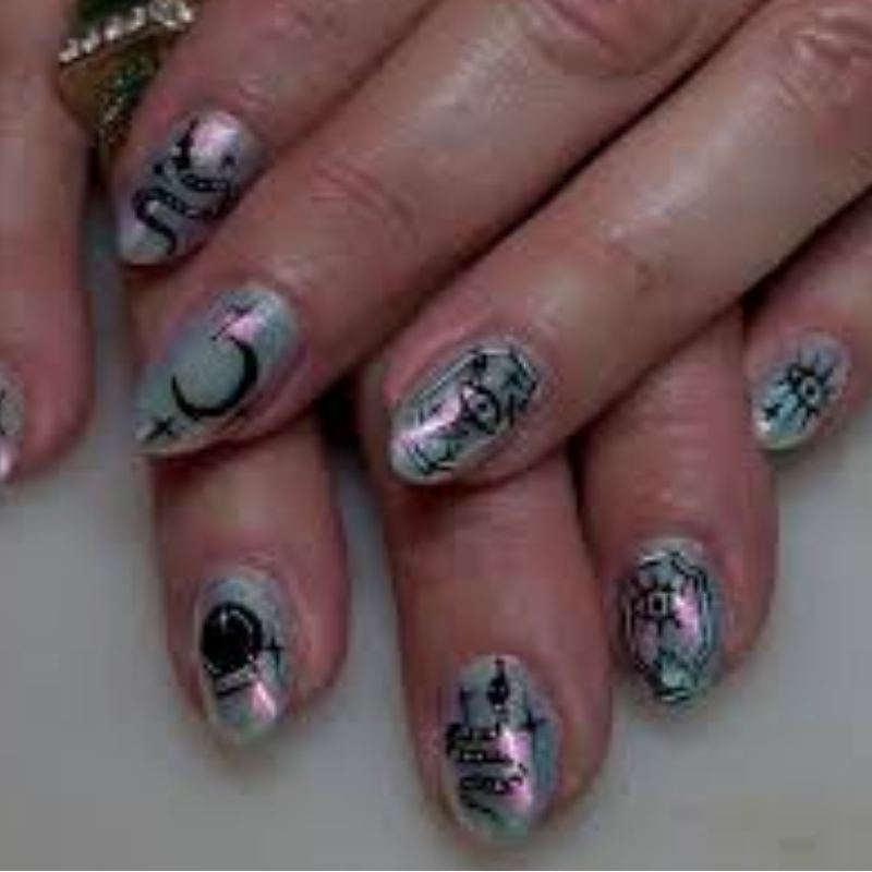 Purple crystal ball with stars on halloween nails