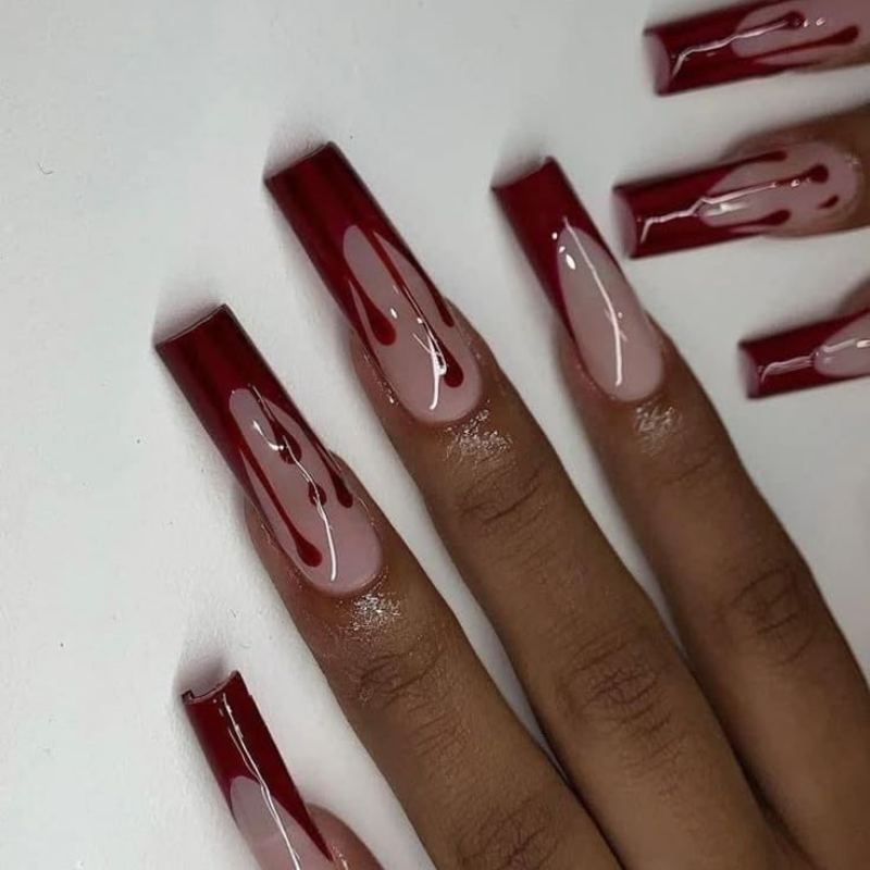 Red blood drip from tips on nude halloween nails