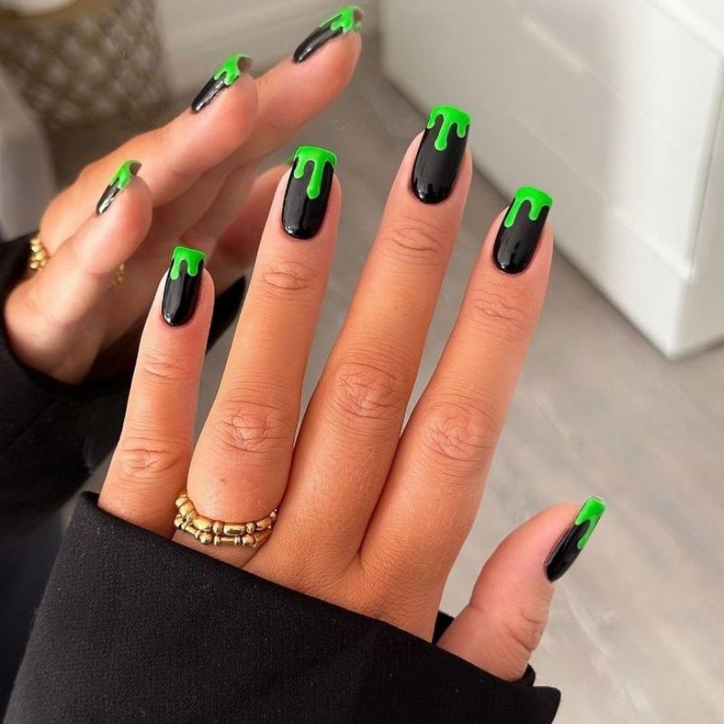 Green frankenstein halloween nails with black stitches