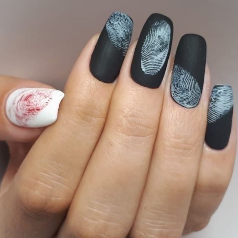 Yellow full moon on dark blue halloween night sky nails