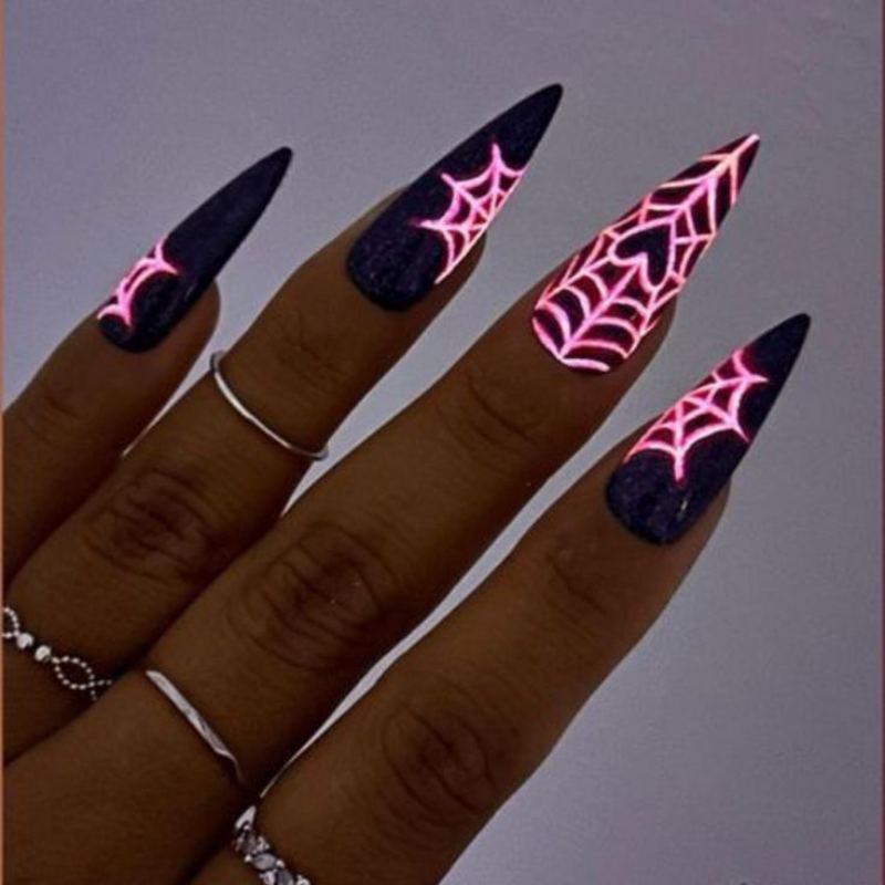 Halloween spider web design on french manicure tips