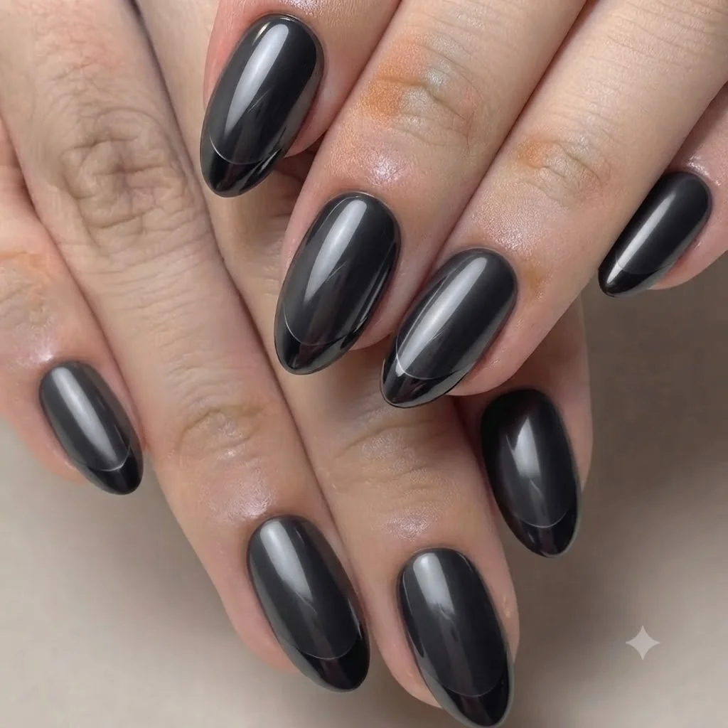 Halloween nail designs 2026 chrome black french tip manicure editorial styled shot
