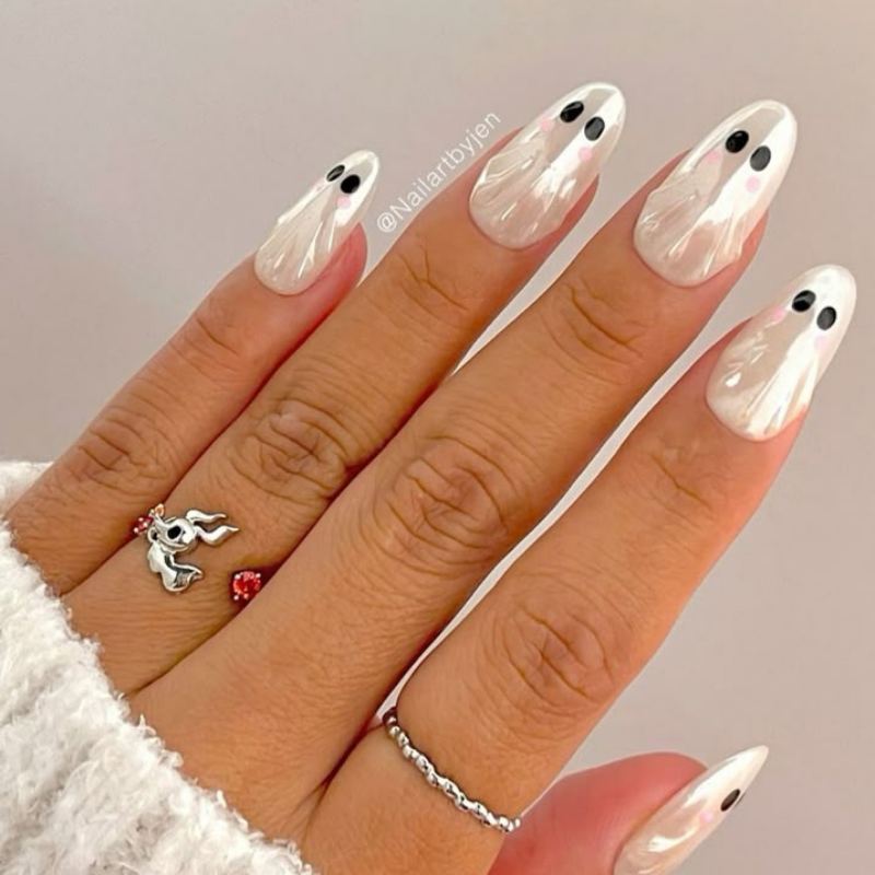 Simple minimalist ghost dots on nude halloween nails