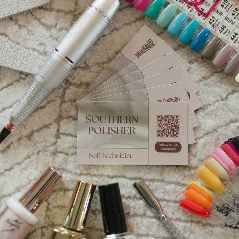 Behind the scenes photo of nail tech workspace with New Year nail supplies