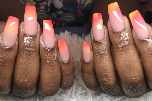 Summer 2025 tropical palm tree nail art with sunset ombre gradient orange pink yellow vacation beach theme